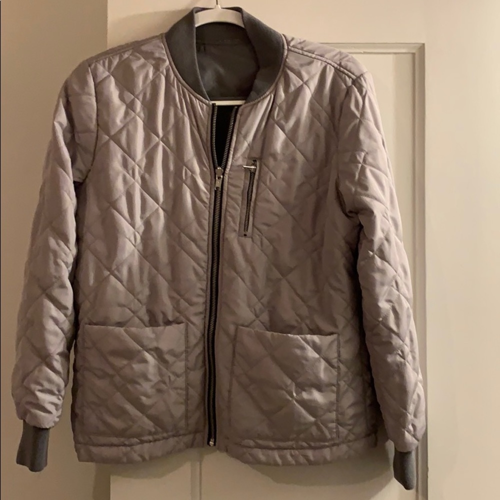 Grey reversible bomber jacket.